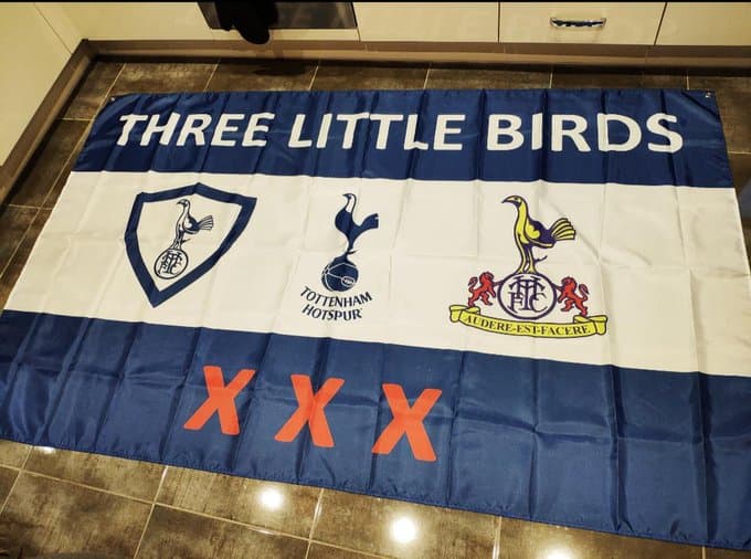 A completed custom football flag shown as finished printed artwork